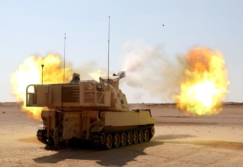 Photograph of a U.S. Army M109 Paladin self-propelled howitzer vehicle in action.