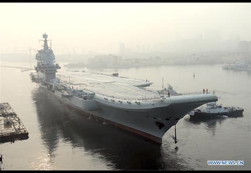 Photograph of a Chinese Navy aircraft carrier.