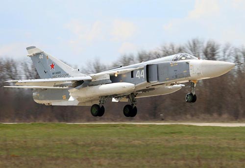 Photograph of a Russian Air Force Sukhoi Su-24 Fencer strike fighter coming in for a landing.